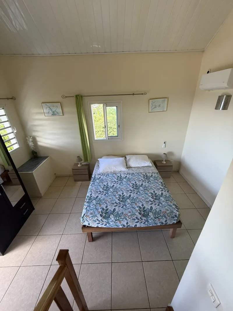 Bedroom with en-suite bathroom at Villa Bigaradier